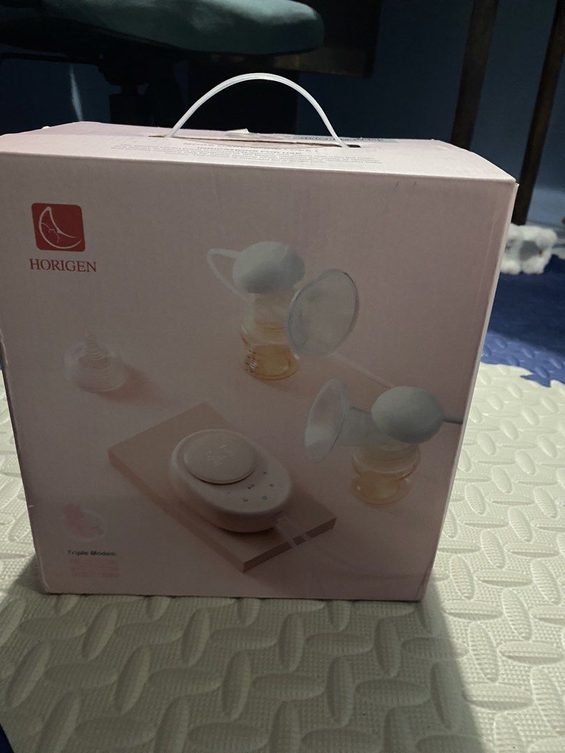 Horigen Wondermore Double Electric Breast Pump (Category: Breastfeeding & Bottle Feeding) located in Manila. Submitted by ziongavin0506 (Listing ID 1463820456, Image 2). Description: - Horigen Wondermore Double Electric Breast Pump - Professional Care Model - 3D Pumping Design: Simulates baby's natural sucking - Triple Modes for customized pumping - Excellent for breastfeeding mothers.