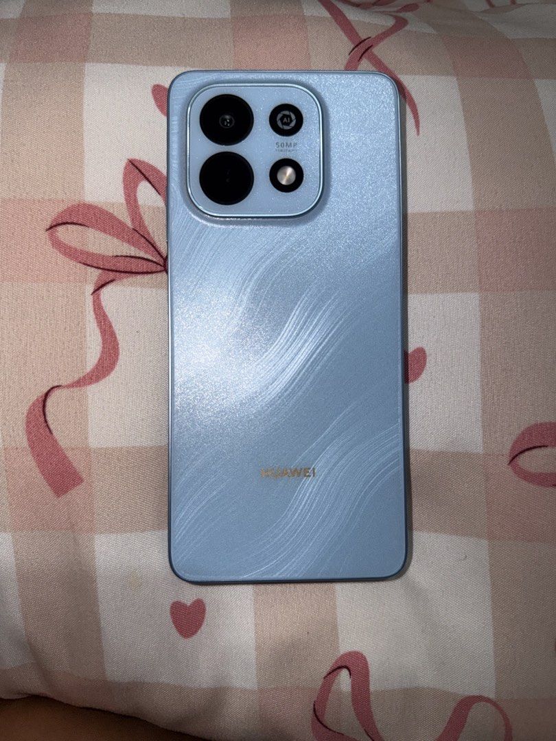 Huawei Nova Y74 (Category: Huawei) located in Manila. Submitted by rrmn10 (Listing ID 1463798871, Image 1). Description: Display and Design * Screen Size: 6.67 inches * Type: LCD, 90Hz refresh rate, up to 850 nits peak brightness * Resolution: HD+ (1604 × 720 pixels) * Durability: SGS 5-star drop resistance, wet-hand touch support * Dimensions & Weight: 166.05 mm x 76.58 mm x 8.32 mm, approx. 210 g * Color: Blue Performance and Software * Process