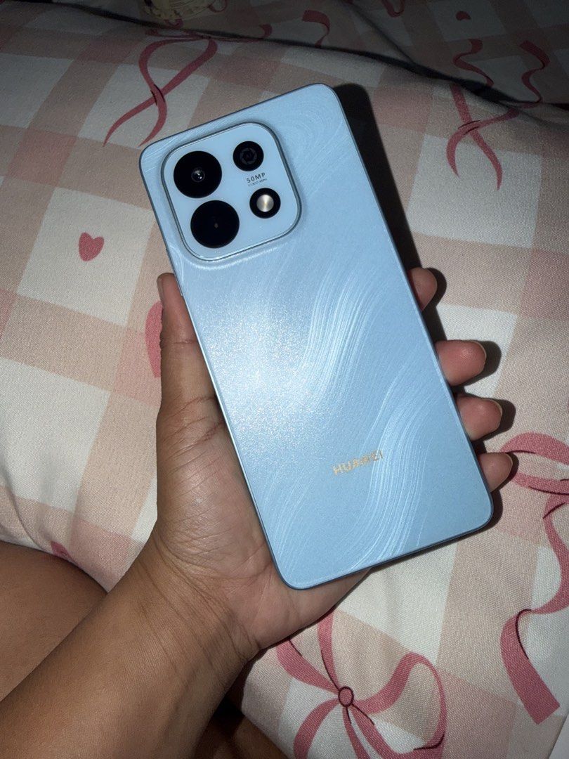 Huawei Nova Y74 (Category: Huawei) located in Manila. Submitted by rrmn10 (Listing ID 1463798871, Image 2). Description: Display and Design * Screen Size: 6.67 inches * Type: LCD, 90Hz refresh rate, up to 850 nits peak brightness * Resolution: HD+ (1604 × 720 pixels) * Durability: SGS 5-star drop resistance, wet-hand touch support * Dimensions & Weight: 166.05 mm x 76.58 mm x 8.32 mm, approx. 210 g * Color: Blue Performance and Software * Process