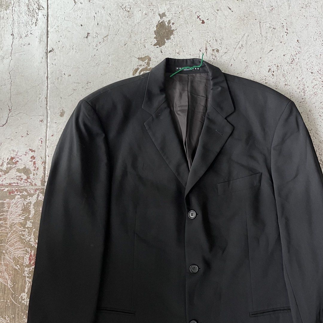 HUGO BOSS black single-breasted three-button blazer with notch lapels (Category: Coats, Jackets and Outerwear) located in Iloilo. Submitted by plugsta (Listing ID 1463807133, Image 3). Description: HUGO BOSS SIZE: L-XL MEASUREMENTS LAID FLAT (IN INCHES): WIDTH: 24 LENGTH: 34 SLEEVE LENGTH: 25 SS: 20 CONDITION: EXCELLENT FLAW/S: NONE.