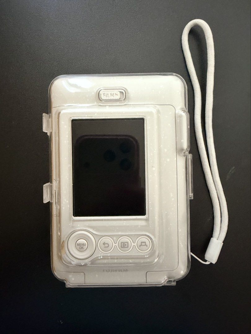 instax Mini LiPlay (White) (Category: Cameras) located in Quezon City. Submitted by blueberrie03 (Listing ID 1463790456, Image 2). Description: - 9/10 still in good condition - 1 year old, used few times and safely stored only - With screen protector - Camera case and 32gb SD card included - with box - RFS: barely used, have other cameras.