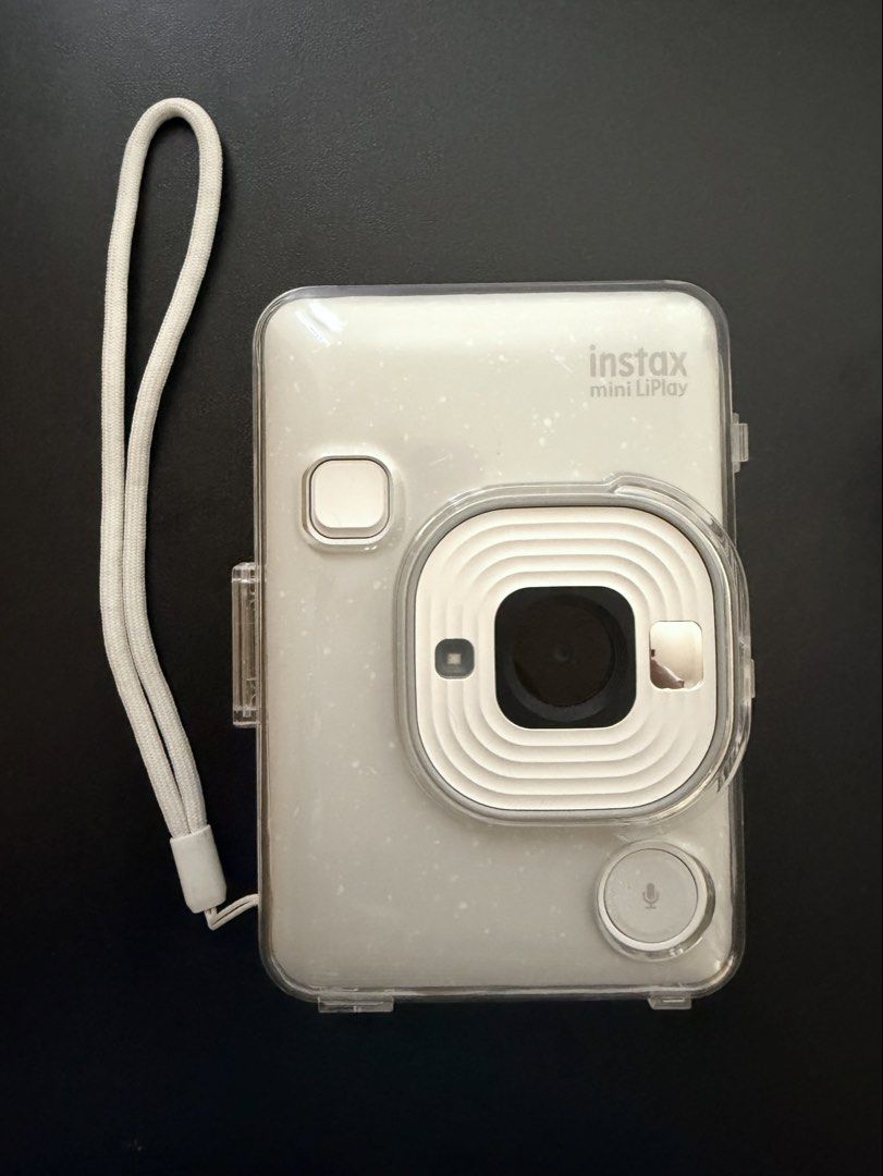 instax Mini LiPlay (White) (Category: Cameras) located in Quezon City. Submitted by blueberrie03 (Listing ID 1463790456, Image 1). Description: - 9/10 still in good condition - 1 year old, used few times and safely stored only - With screen protector - Camera case and 32gb SD card included - with box - RFS: barely used, have other cameras.