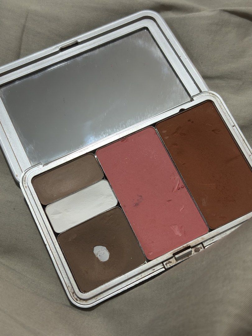 Issy Palette (Matte Highlighter, Bronzer, Contour, & Blush) (Category: Makeup) located in Cabuyao City. Submitted by benerbo (Listing ID 1463791591, Image 2). Description: Shades: Contour: Eclipse and Griege Matte highlighter: Blanc Blush: Erotic Bronzer: Ember.