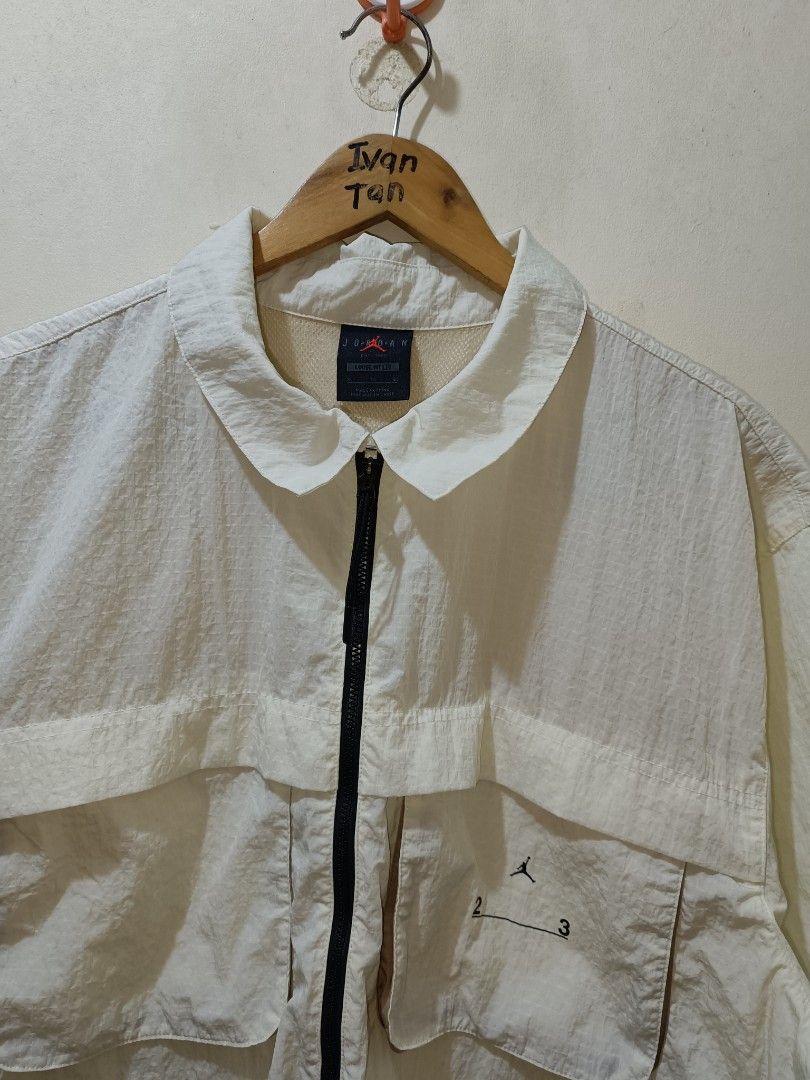 Jordan 23 Engineered Short Sleeve Zip Jacket (Category: Tshirts & Polo Shirts ) located in Makati City. Submitted by ivsseyow03 (Listing ID 1463748493, Image 3). Description: Cream colored Jordan 23 Engineered jacket. Short sleeves with a zip-up front. Two chest pockets and two lower pockets. Lightweight material. Great for layering or wearing on its own..