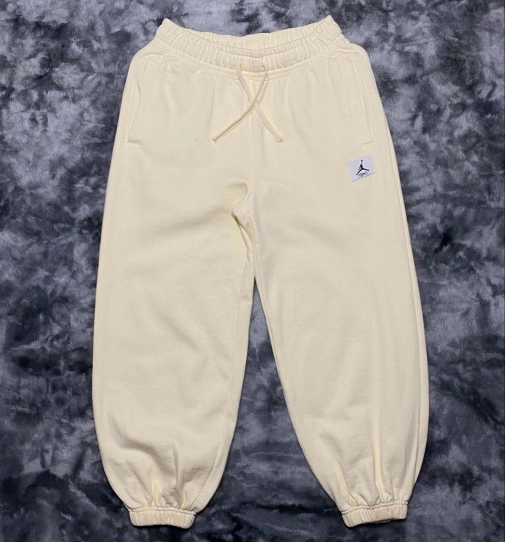 Jordan Flight Fleece Sweatpants Cream (Category: Joggers) located in Sorsogon. Submitted by johnmichae69459 (Listing ID 1463867574, Image 1). Description: - Cream colored Jordan sweatpants - Comfortable cotton and polyester blend - Elastic waistband with adjustable drawstring - 28 to 34 waistline - 37 lenght - Jogger style with elastic cuffs for a snug fit - Small Jordan Flight logo patch on the left leg - Ideal for everyday casual wear.