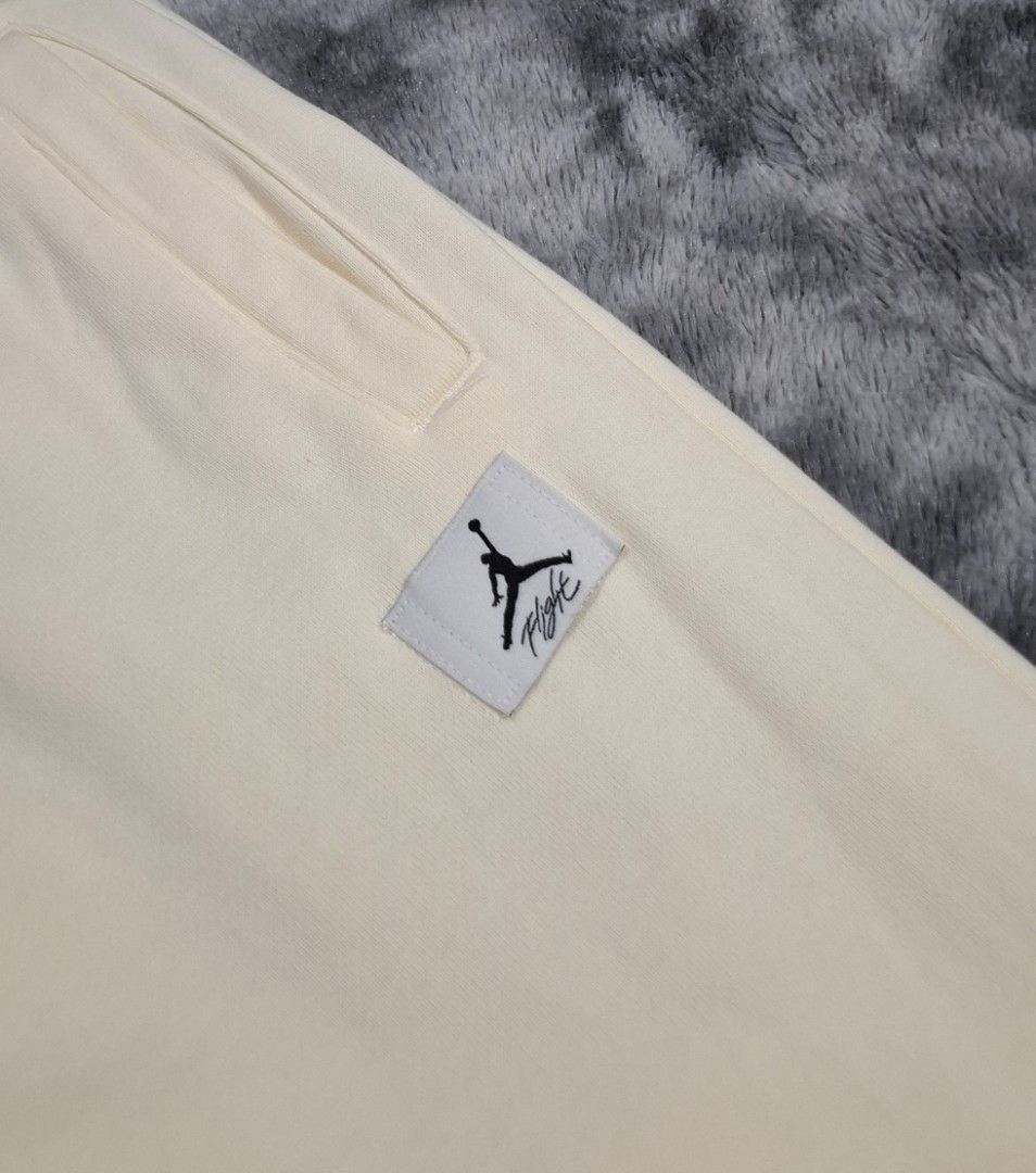 Jordan Flight Fleece Sweatpants Cream (Category: Joggers) located in Sorsogon. Submitted by johnmichae69459 (Listing ID 1463867574, Image 3). Description: - Cream colored Jordan sweatpants - Comfortable cotton and polyester blend - Elastic waistband with adjustable drawstring - 28 to 34 waistline - 37 lenght - Jogger style with elastic cuffs for a snug fit - Small Jordan Flight logo patch on the left leg - Ideal for everyday casual wear.