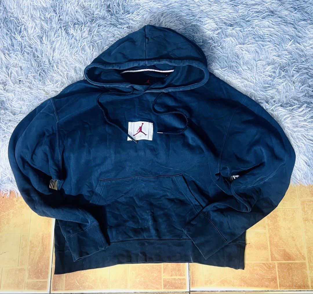 Jordan Navy Blue Hoodie (Category: Coats, Jackets and Outerwear) located in Manila. Submitted by zealocean.1db413 (Listing ID 1463934584, Image 1). Description: - Classic navy blue Jordan hoodie - Iconic Jumpman logo patch on chest - Front pouch pocket - Adjustable drawstring hood - Comfortable and stylish for casual wear.