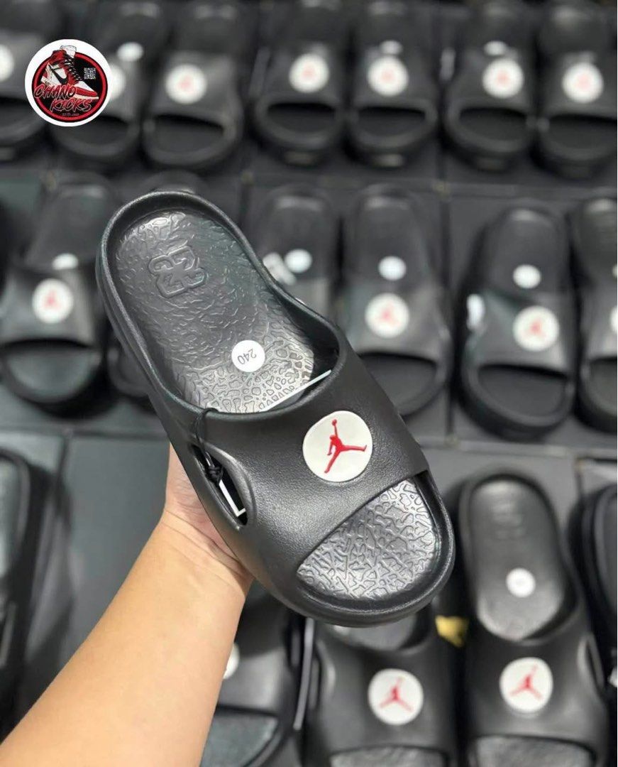 Jordan Slides Black (Category: Slippers & Slides) located in Agdangan. Submitted by chano11339 (Listing ID 1463844499, Image 1). Description: - Classic black Jordan slides - Features the iconic Jumpman logo - Designed for comfort and easy slip-on wear - Ideal for casual outings or post-game recovery.