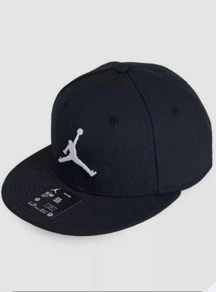 Jordan Snapback Cap Black White Jumpman Logo (Category: Caps & Hats) located in Agdangan. Submitted by chano11339 (Listing ID 1463845262, Image 1). Description: - Classic black Jordan snapback - Iconic white Jumpman logo on front - Adjustable strap for a custom fit - Perfect for everyday wear - Multiple pieces available.
