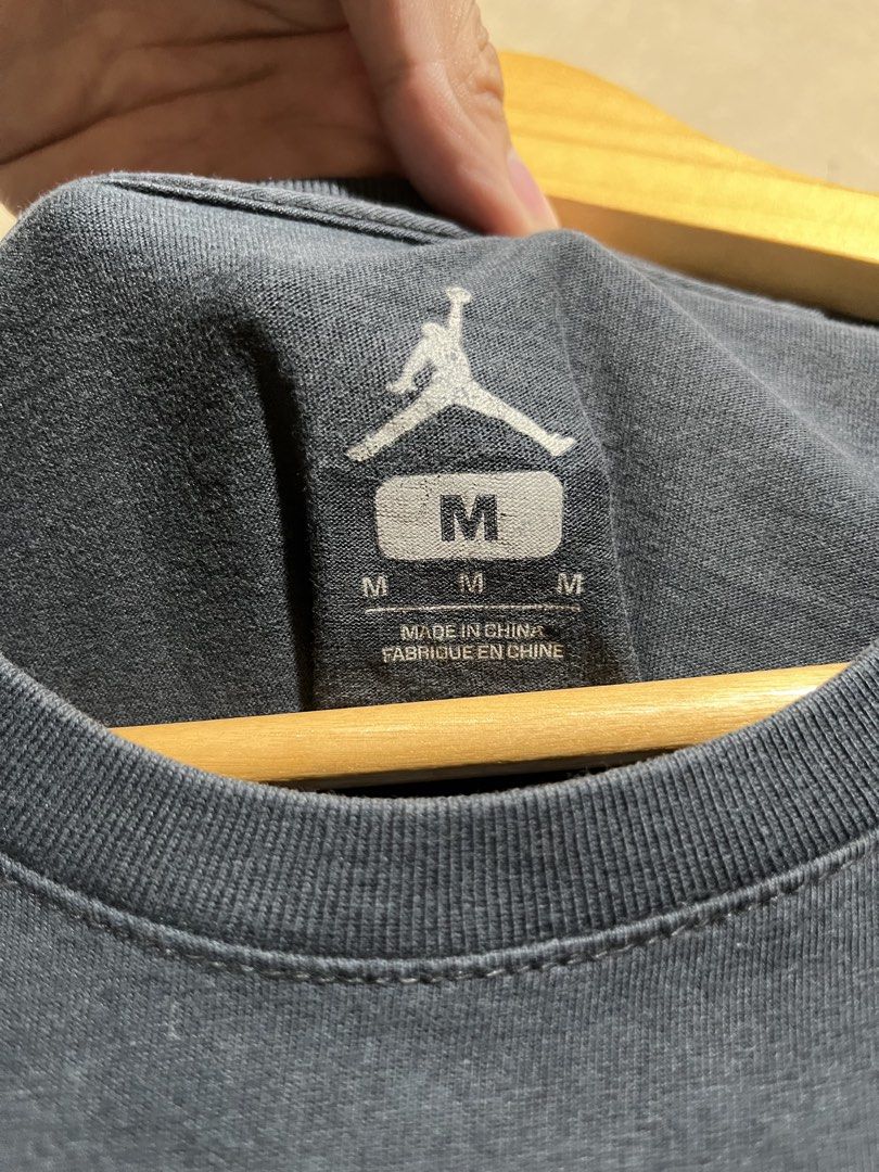 Jordan T-Shirt Size M (Category: Tshirts & Polo Shirts ) located in Manila. Submitted by rylthriftz12 (Listing ID 1463893445, Image 3). Description: - Grey Jordan T-shirt - Size: Medium (M) - Ideal for casual outings - Made in China.