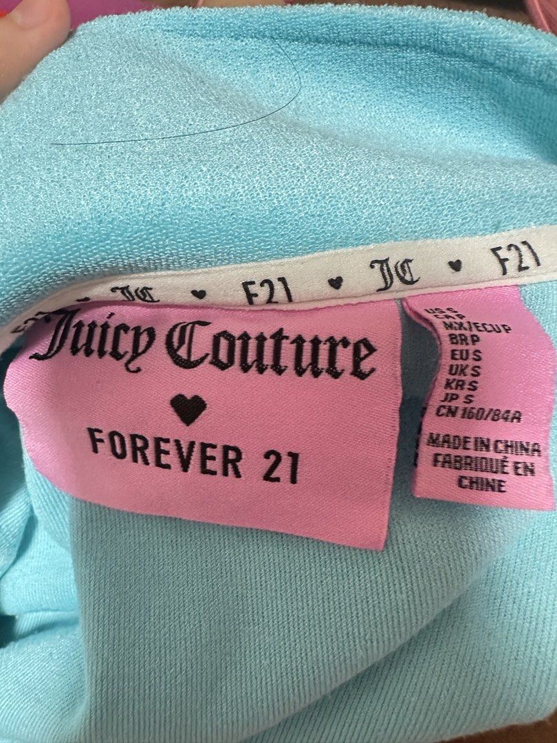 Juicy Couture x Forever 21 Velour Button-Up Top (Category: Longsleeves) located in Pasig City. Submitted by s4sayaki (Listing ID 1463775101, Image 2). Description: - Cute light blue velour top - Brand: Juicy Couture (with embroidered logo) & Forever 21 - Button-up front with a collar - Super comfy feel - Ideal for lounging or casual wear.