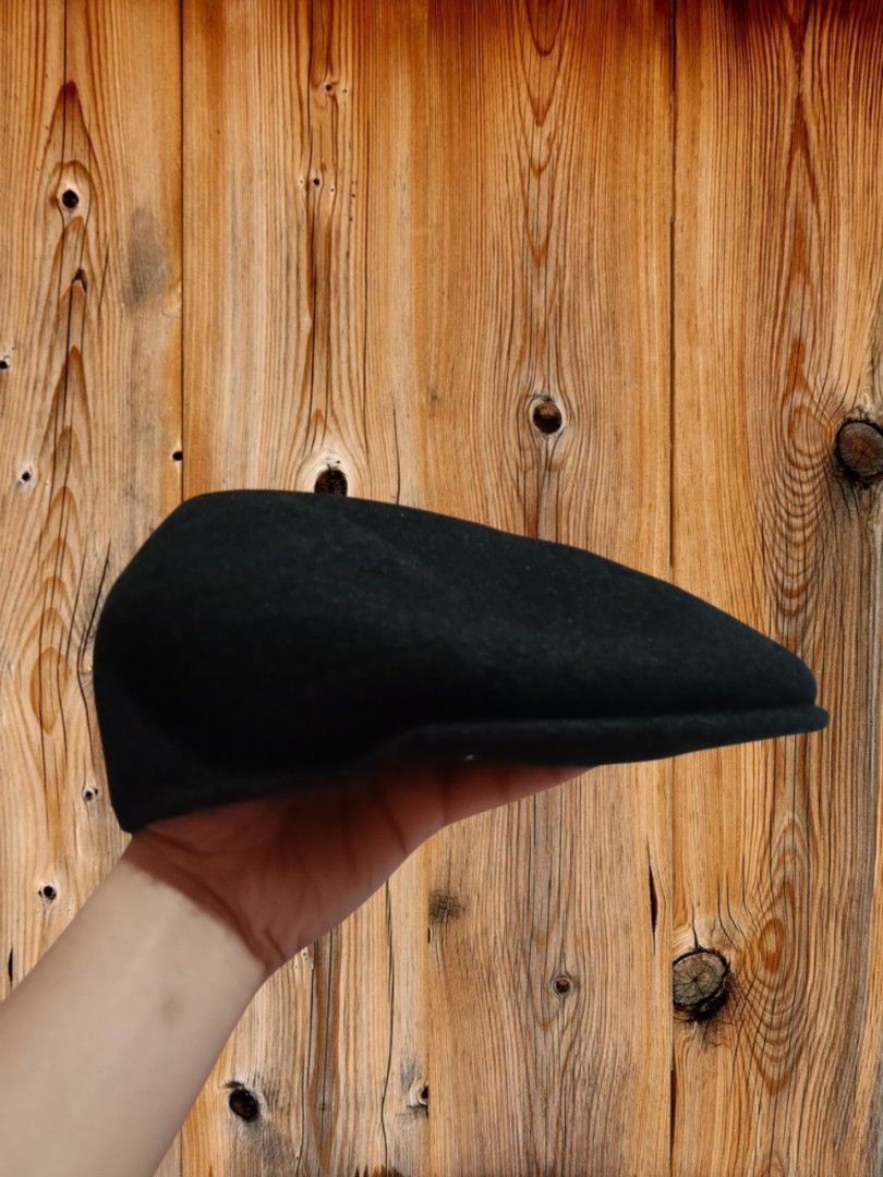 Kangol Wool 504 (Category: Caps & Hats) located in Davao. Submitted by ayeeasyshop13 (Listing ID 1463914045, Image 2). Description: That's a classic black Kangol Wool 504 flat cap featuring the brand's iconic embroidered white kangaroo logo on the front. As new condition 650 + SF.