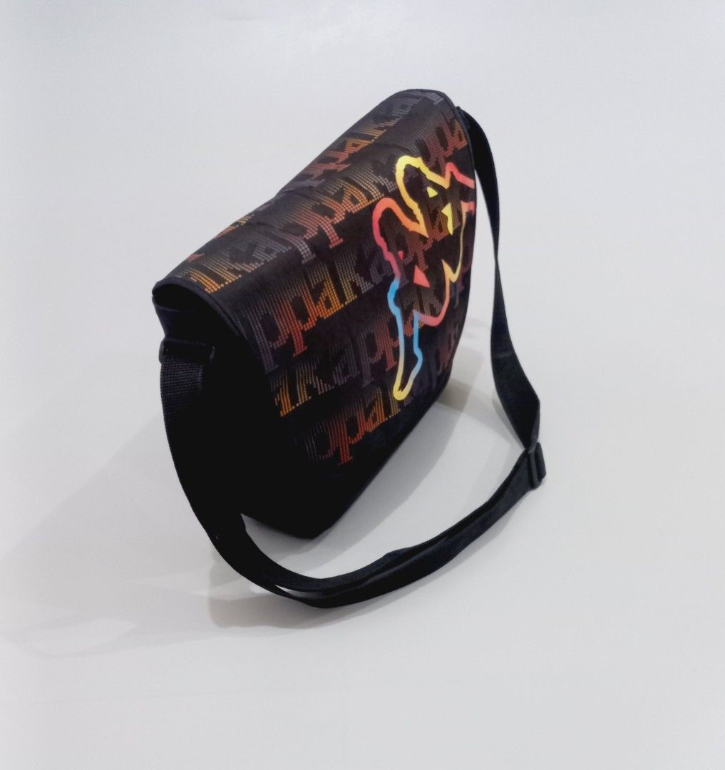 Kappa Messenger Bag with Rainbow Logo (Category: Sling Bags) located in Cebu City. Submitted by MrLiks_123 (Listing ID 1463820113, Image 3). Description: Kappa Messenger bag Unisex Inches Dimension : Width 15 / length 11 - Features iconic rainbow gradient Kappa logo - All-over repeating Kappa logo pattern - Adjustable strap for comfortable fit - Ideal for everyday essentials and daily use Excellent to new Cebu Location Dm.