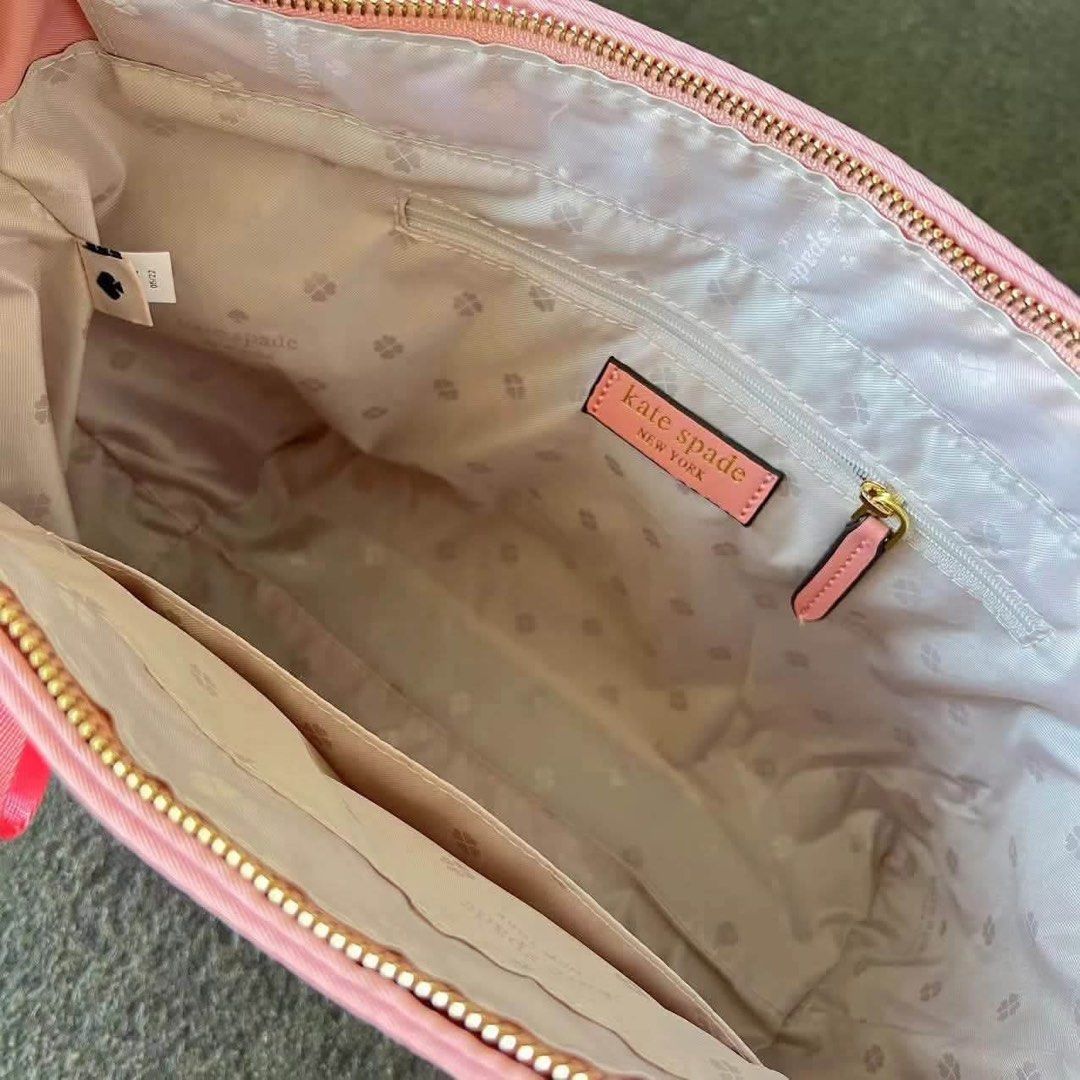 Kate Spade Chelsea Tote Bag Medium (Category: Tote Bags) located in Abucay. Submitted by erindeclutterss (Listing ID 1463858508, Image 3). Description: - Material: Nylon with leather trim - Closure: Zip top - Exterior: Zip pocket - Interior: Slip pockets - Strap: Detachable shoulder strap - Hardware: Gold-tone - Ideal for: Everyday use.