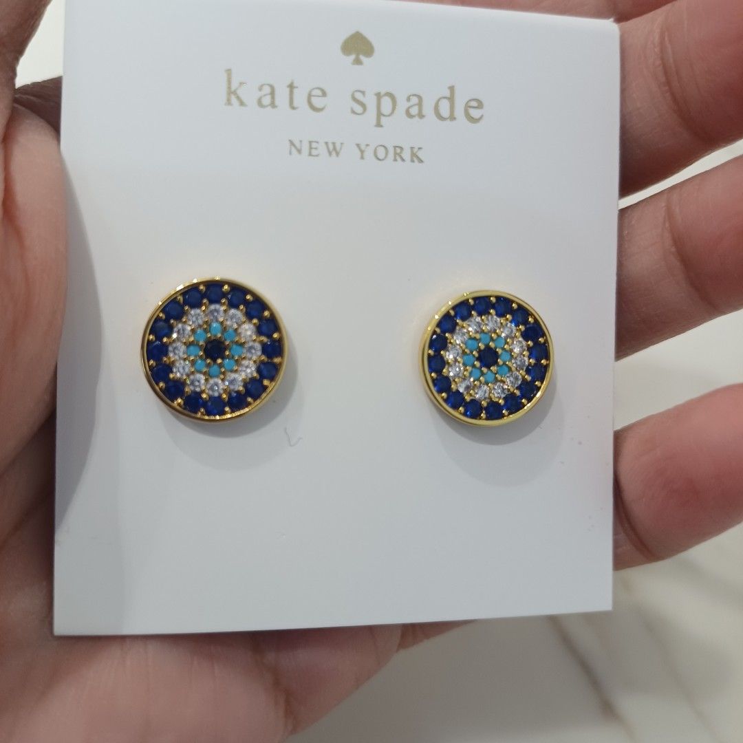 Kate Spade Evil Eye Stud Earrings Gold Blue White (Category: Earrings) located in Manila. Submitted by manalastas12411 (Listing ID 1463850301, Image 1). Description: - Cute evil eye stud earrings from Kate Spade - Gold tone with blue and white stones - Perfect size for everyday wear - Comes with original Kate Spade card - Makes a great gift idea.