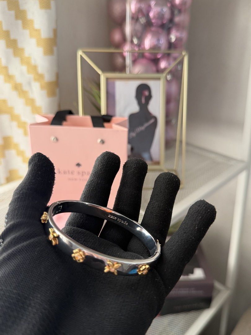 Kate Spade Silver & Gold Flower Bangle Bracelet (Category: Luxury Accessories) located in Quezon City. Submitted by megchrisanne (Listing ID 1463934990, Image 1). Description: Brandnew Katespade twotoned .