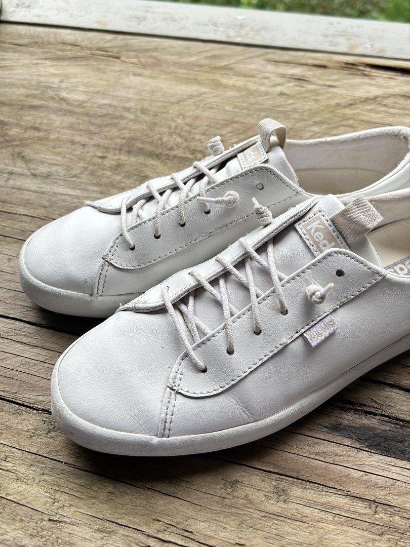 Keds White Leather Lace-Up Sneakers (Category: Sneakers) located in Baguio. Submitted by tresmariascloset13 (Listing ID 1463773855, Image 2). Description: - Classic white leather Keds sneakers - Comfortable lace-up style for everyday wear - Minor scuffs on soles and slight creasing on leather - Size USA8 Please check images for flaws.