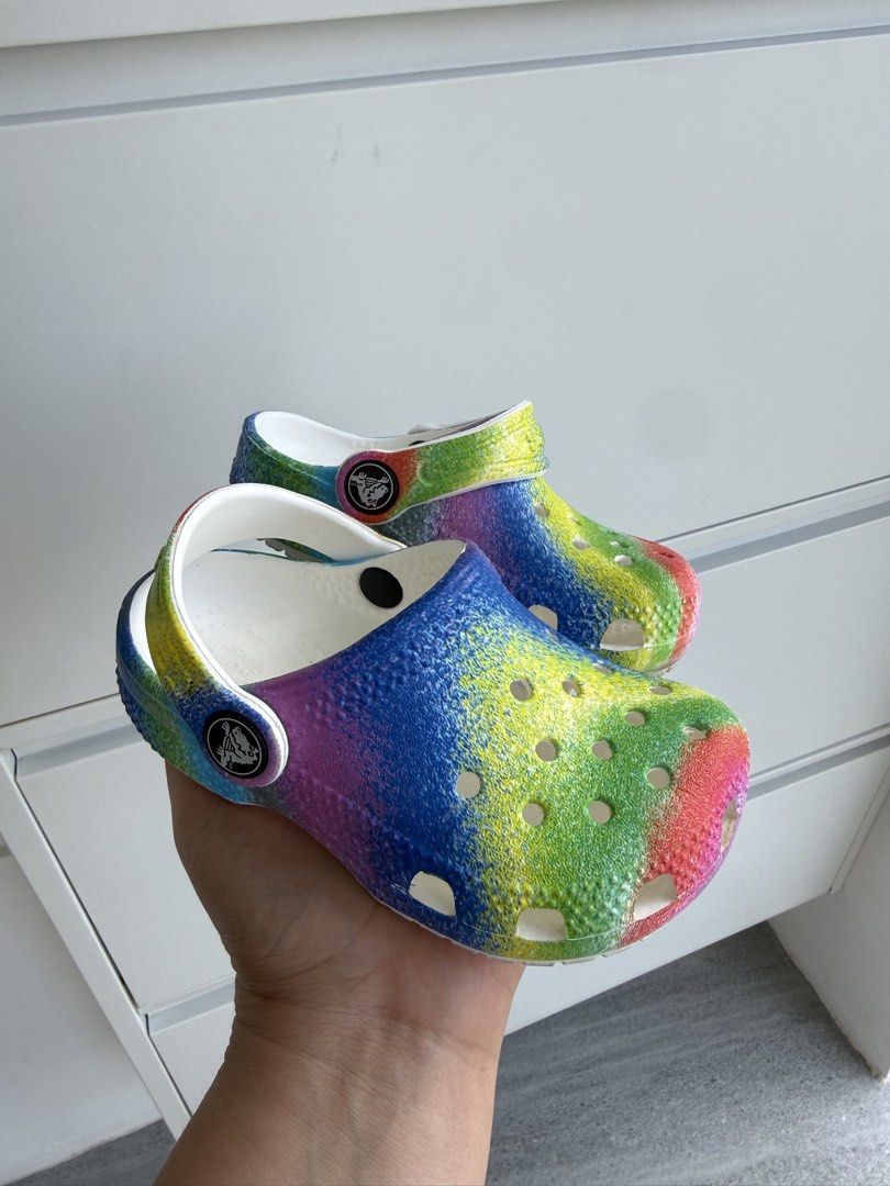 Kids' Crocs Jibbitz Rainbow Tie-Dye Clogs Size 7 (Category: Babies & Kids Fashion) located in Iloilo. Submitted by papillon30 (Listing ID 1463782589, Image 1). Description: - Cute rainbow tie-dye Crocs for kids - Size 7 - Easy slip-on style - Great for everyday wear or playing outside - Vibrant and fun tie-dye pattern - Perfect for colorful shoe lovers.