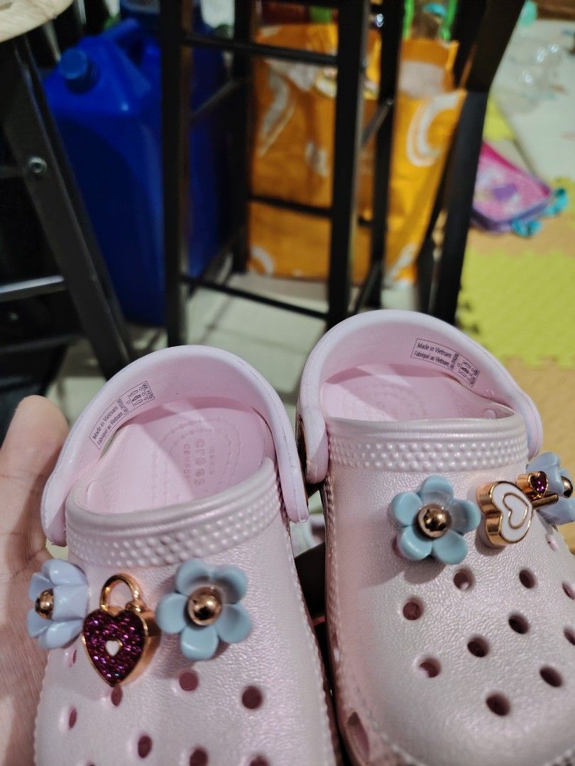 Kids Pink Crocs with Charms (Category: Babies & Kids Fashion) located in Makati City. Submitted by jayclutter0976004 (Listing ID 1463827615, Image 2). Description: - Adorable pink Crocs for kids - Comes with cute flower and heart charms - Easy slip-on design for little feet - Ideal for playtime and everyday casual wear - Made in Vietnam.