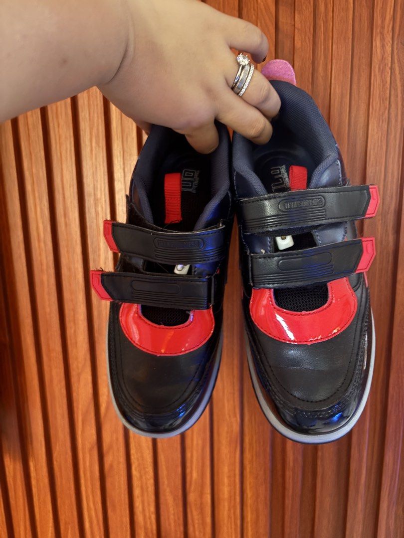 Kids Roller Shoes with Wheels & lights (Category: Babies & Kids Fashion) located in Manila. Submitted by tindahan_ni.alingnena (Listing ID 1463778042, Image 1). Description: - Stylish black and red roller shoes for kids. - Secure velcro strap closure. - Built-in wheels for easy rolling. - Features a cool graphic on the side (possibly Optimus Prime). - Ideal for active play and outdoor fun. Size 38 With lights Rechargeable.