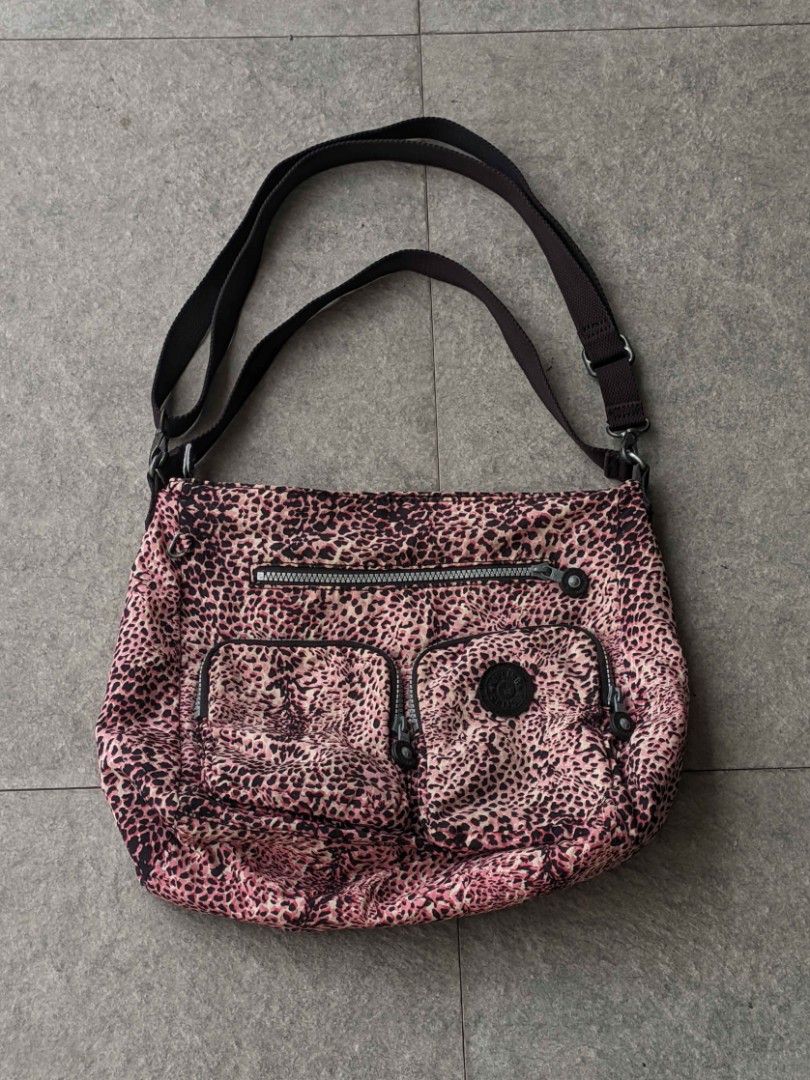 Kipling Leopard Print Shoulder Crossbody Bag (Category: Shoulder Bags) located in San Mateo. Submitted by rick_enzo (Listing ID 1463809446, Image 1). Description: for sale kipling bag sling bag crossbody bag handbag original adjustable strap pink leopard print front utility pockets working zippers good condition 2000 san mateo, rizal meetup within or near san mateo, or gma kamuning during wednesdays delivery lalamove j&t first to pay, can vidcall