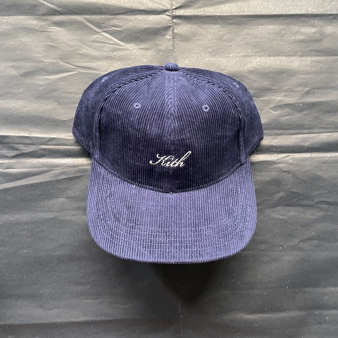 Kith Corduroy Cap Navy Blue (Category: Caps & Hats) located in Manila. Submitted by sydge_ (Listing ID 1463780987, Image 1). Description: - Navy blue corduroy cap from Kith - Features embroidered Kith logo on the front - Adjustable strap at the back for a custom fit - Classic dad hat style - Ideal for everyday wear.
