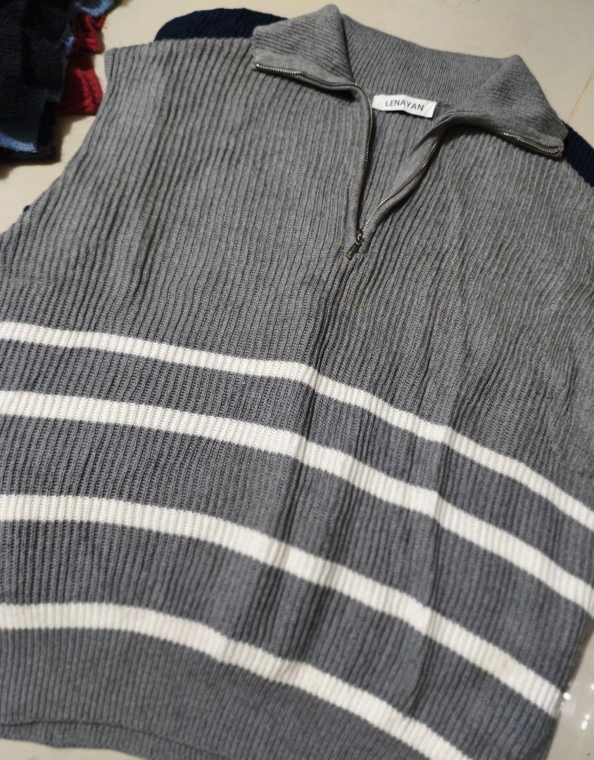 Knitted Vest (Category: Vests) located in Manila. Submitted by angkol_lest32 (Listing ID 1463808054, Image 3). Description: - Navy blue knit vest - Features cute yellow cherubs and white hearts - Ribbed texture for added detail - Classic V-neckline - Ideal for layering over t-shirts or long-sleeve tops.