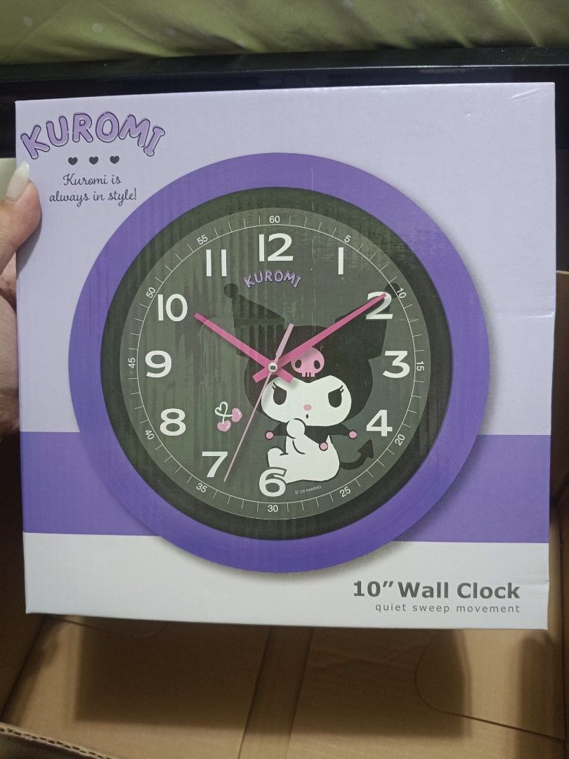 Kuromi Clock, Perfume, Apron, Storage Bin & More! (Category: Character Goods) located in Imus. Submitted by mrpp03 (Listing ID 1463895045, Image 2). Description: Selling a Kuromi bundle! Includes a 10" wall clock with quiet sweep movement. Also a Kuromi Eau de Toilette. There's a Kuromi apron and a collapsible storage bin. Lots of stationery items like pens, a pencil sharpener, and stickers too. A purple cap is also included. All items are Kuromi
