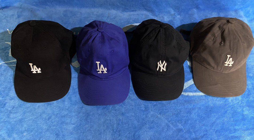 LA Dodgers & NY Yankees Baseball Caps Bundle (Category: Caps & Hats) located in Cebu City. Submitted by monflor (Listing ID 1463819243, Image 2). Description: - Bundle of 4 baseball caps - Includes 2 LA Dodgers caps (1 black, 1 royal blue) - Includes 1 New York Yankees cap (black) - Includes 1 LA Dodgers cap (grey) - All caps feature adjustable straps - Perfect for any baseball fan! Good condition Prices each Black 650 blue 600 grey 550 Pm for mo