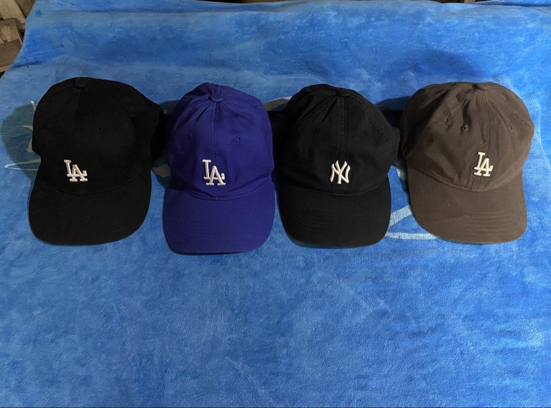 LA Dodgers & NY Yankees Baseball Caps Bundle (Category: Caps & Hats) located in Cebu City. Submitted by monflor (Listing ID 1463819243, Image 1). Description: - Bundle of 4 baseball caps - Includes 2 LA Dodgers caps (1 black, 1 royal blue) - Includes 1 New York Yankees cap (black) - Includes 1 LA Dodgers cap (grey) - All caps feature adjustable straps - Perfect for any baseball fan! Good condition Prices each Black 650 blue 600 grey 550 Pm for mo