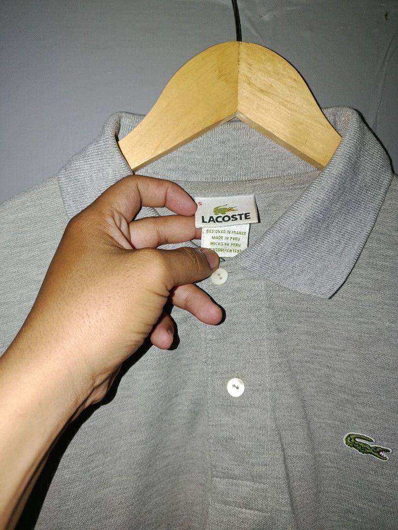 Lacoste polo shirt (Category: Formal Shirts) located in Maasin. Submitted by johnnhel14 (Listing ID 1463759025, Image 2). Description: Excellent condition no issue dimes:21x27.