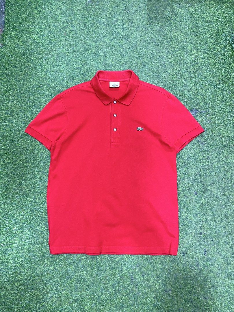 Lacoste Red Polo Shirt Size 4 (Category: Tshirts & Polo Shirts ) located in Balamban. Submitted by gogochrist09668 (Listing ID 1463894585, Image 1). Description: - Classic red Lacoste polo shirt - Iconic embroidered crocodile logo on chest - Two-button placket with grey buttons - Size: 4 19W 25L - Material: Comfortable cotton - Style: Great for casual or smart-casual looks.