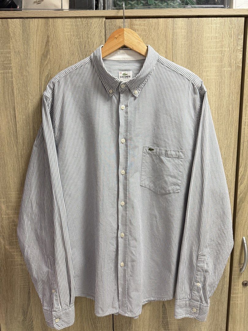 Lacoste Striped Buttondown Longsleeve (Category: Formal Shirts) located in Imus. Submitted by rckrmns (Listing ID 1463790559, Image 1). Description: Lacoste Striped Buttondown Longsleeve Size 44 fits XL W- 25 L- 30 Good as new no issues .