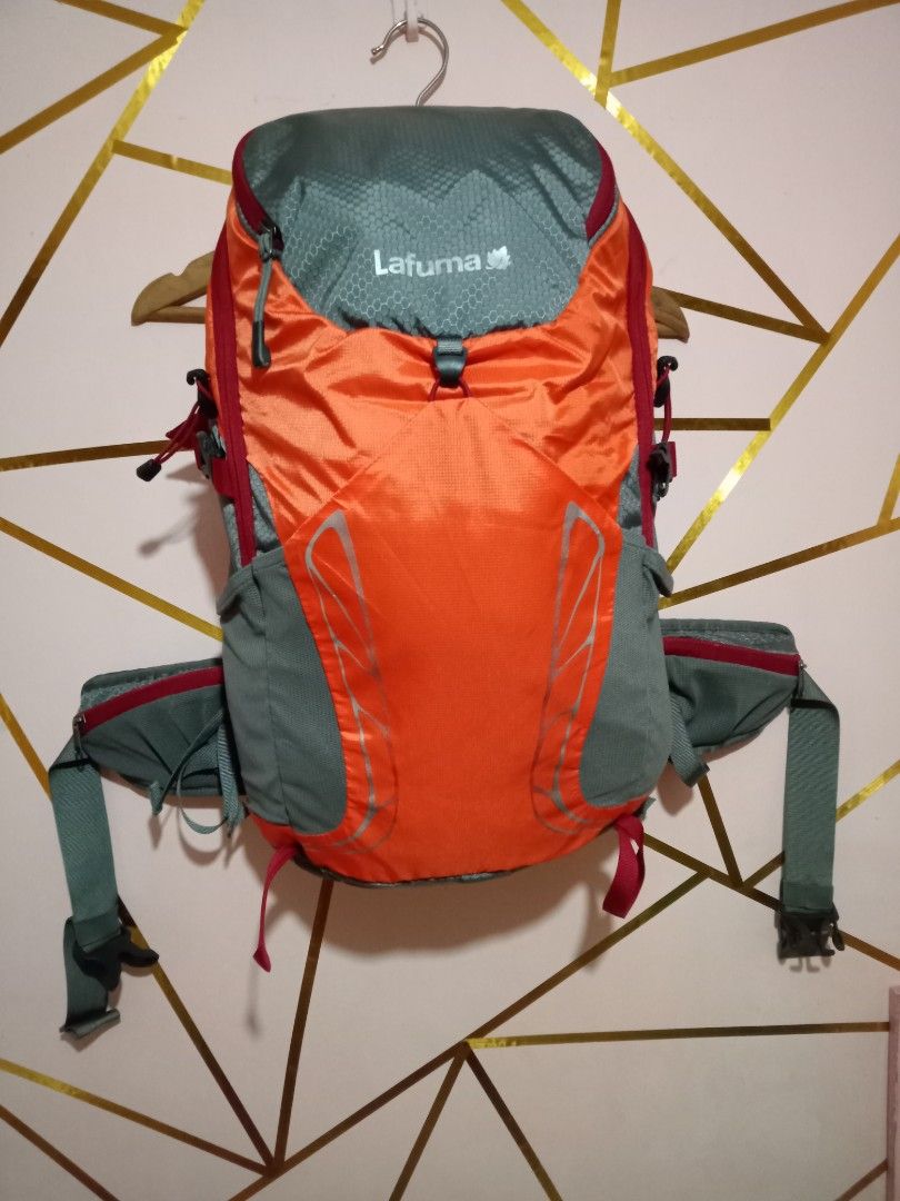Lafuma Orange Grey Hiking Backpack (Category: Backpacks) located in General Santos City (Dadiangas). Submitted by loloikoh63127 (Listing ID 1463831827, Image 1). Description: - Orange and grey Lafuma backpack - Perfect for hiking or day trips - Multiple pockets for organization - Adjustable straps for a comfortable fit - Padded back and hip belt for support - Ready for your next adventure!.
