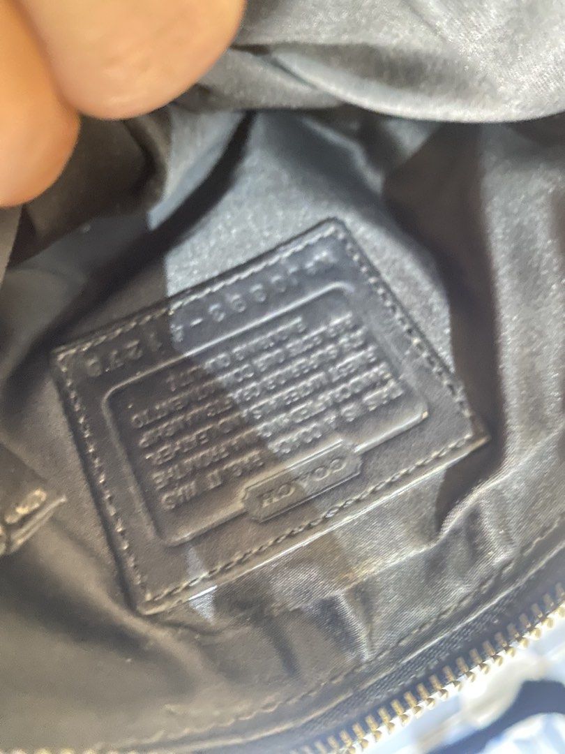 Leather coach sling bag (Category: Sling Bags) located in Tumauini. Submitted by calmearth-bc99 (Listing ID 1463755654, Image 3). Description: Leather coach sling bag.