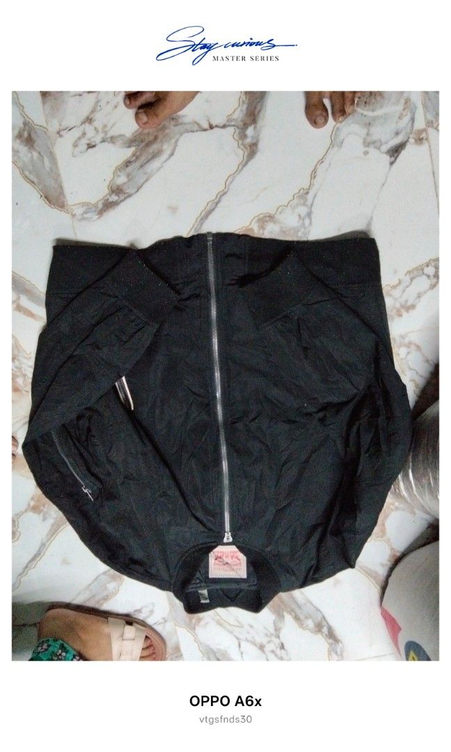 Levi Strauss & Co. Bomber Jacket (Category: Coats, Jackets and Outerwear) located in Manila. Submitted by vtg_finds30 (Listing ID 1463672078, Image 1). Description: - Brand: Levi Strauss & Co. - Style: Black Bomber Jacket - Material: Polyester - Closure: Full zip - Pockets: Zippered side pockets - Features: Ribbed collar, cuffs, and hem - Size: XXL - Ideal for: Everyday wear boxy cropped.