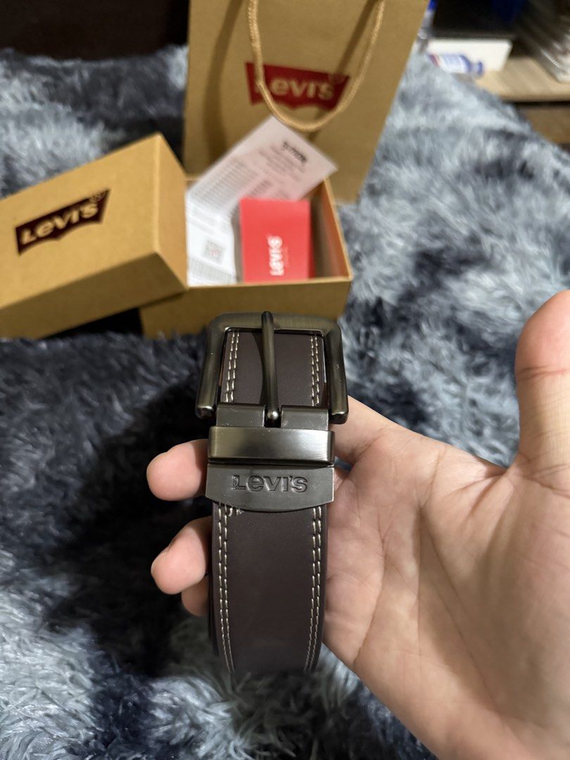 Levi's Reversible Belt with Buckle (Category: Belts) located in Manila. Submitted by adriyawnnn (Listing ID 1463928011, Image 3). Description: - Genuine Brown Levi's Belt - Reversible Design - Classic Metal Buckle - Detailed Stitching Along Edges - Comes with Original Box, Paper Bag, and Card - Versatile Accessory for Any Outfit.