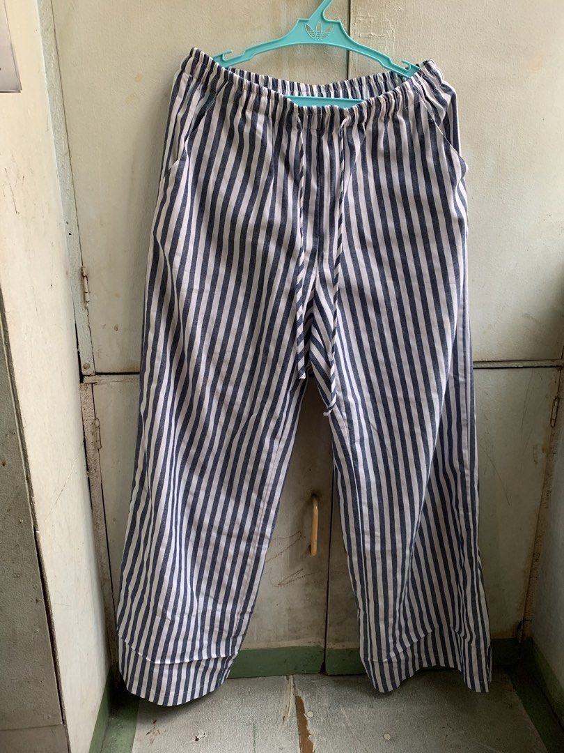 Linen pants (Category: Undergarments & Loungewear) located in Manila. Submitted by usagichan_rabbit (Listing ID 1463782436, Image 1). Description: - Comfy striped pants with blue and white vertical stripes. - Elastic waistband with adjustable drawstring. - Relaxed wide-leg style for ultimate comfort. - Soft and breathable material, ideal for lounging or sleeping. - Convenient side pockets. - Easy to wear and style. Size medium May konting tanggal