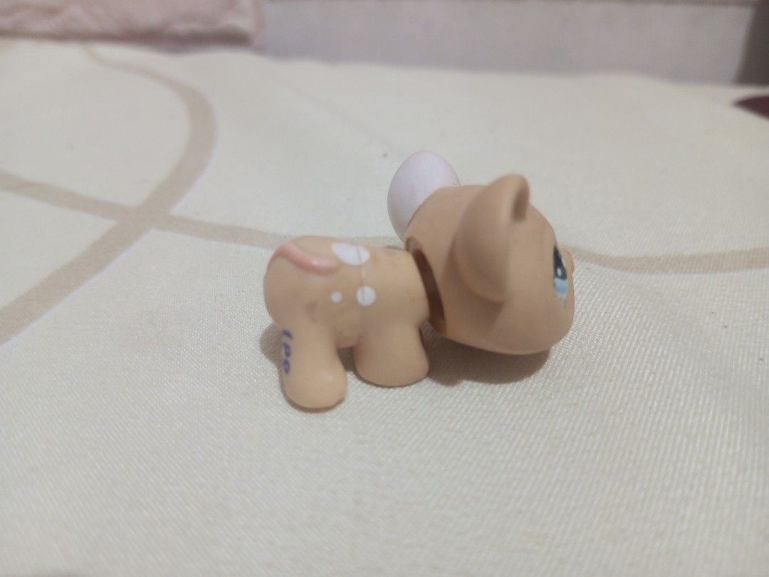 Littlest Pet Shop Deer Toy (Category: Kids Toys) located in Victorias. Submitted by tobylacua26871 (Listing ID 1463864385, Image 2). Description: - Cute Littlest Pet Shop deer toy - Light brown with white spots - Adorable blue eyes - Minor purple markings on one leg - Head and body are separate pieces - Ideal for Littlest Pet Shop collectors.