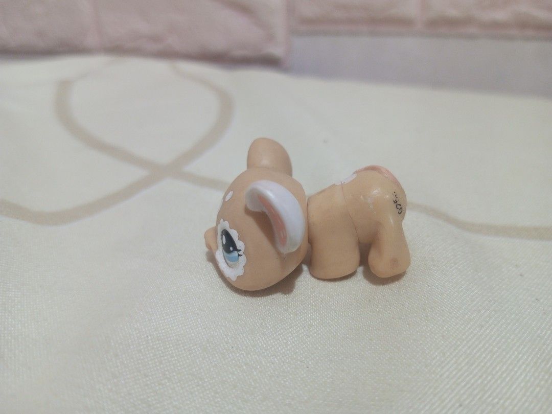 Littlest Pet Shop Deer Toy (Category: Kids Toys) located in Victorias. Submitted by tobylacua26871 (Listing ID 1463864385, Image 3). Description: - Cute Littlest Pet Shop deer toy - Light brown with white spots - Adorable blue eyes - Minor purple markings on one leg - Head and body are separate pieces - Ideal for Littlest Pet Shop collectors.