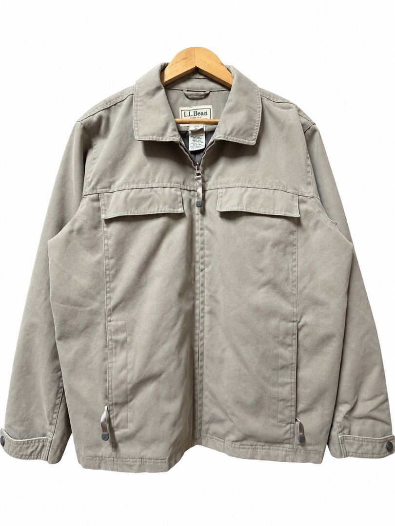 l.l.bean Men's Tan Cotton Blend Zip-Up Jacket (Category: Coats, Jackets and Outerwear) located in Tangub. Submitted by laurbepena33002 (Listing ID 1463891369, Image 1). Description: - Classic L.L.Bean jacket - Color: Tan - Material: heavy canvas like carhartt - Features: Full zip front, two chest pockets, two side pockets, button cuffs - Style: Great for everyday wear - Dimension W23” x L28” x SL 26”.