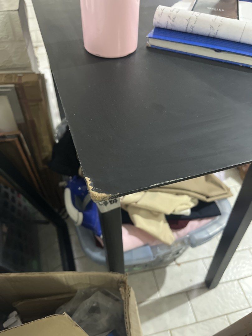 Long Black Dining Table (Category: Tables & Sets) located in Makati City. Submitted by apwellloved (Listing ID 1457721571, Image 3). Description: - Long black table - Versatile: Use as a dining table or workspace - Sturdy black legs - Space-saving design, fits narrow areas - Easy to clean surface -Size: 47 inches (L) x 18 inches (W) x 32 inches (H) - Reason for selling: Decluttering - Pick up only.