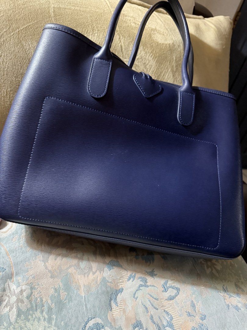 Longchamp Roseau Tote Bag Navy Blue (Category: Luxury Bags & Wallets) located in Rizal. Submitted by xsbaggage_ (Listing ID 1463763594, Image 2). Description: - Brand: Longchamp - Color: Navy Blue - Material: Leather - Features: Spacious interior, comfortable handles - Authentic in pristine condition, very minor flaw inside, pls dm for details.