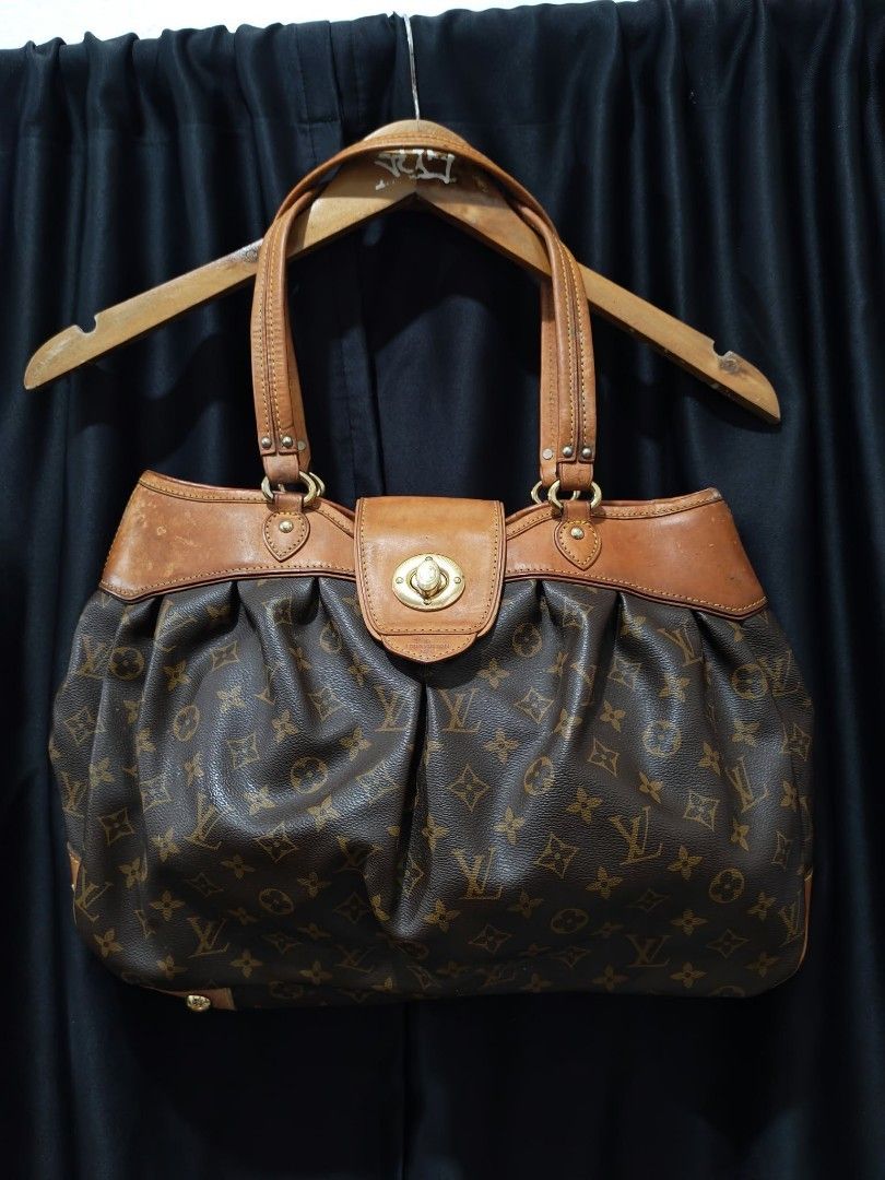 Louis Vuitton Monogram Galliera GM Tote Bag (Category: Luxury Bags & Wallets) located in Baguio. Submitted by solo_ukay (Listing ID 1463802840, Image 2). Description: - Authentic Louis Vuitton Monogram Galliera GM tote bag - Classic LV monogram canvas with tan leather trim and handles - Spacious interior with a twist-lock closure - Zipper pull has some fraying - Perfect for everyday use.