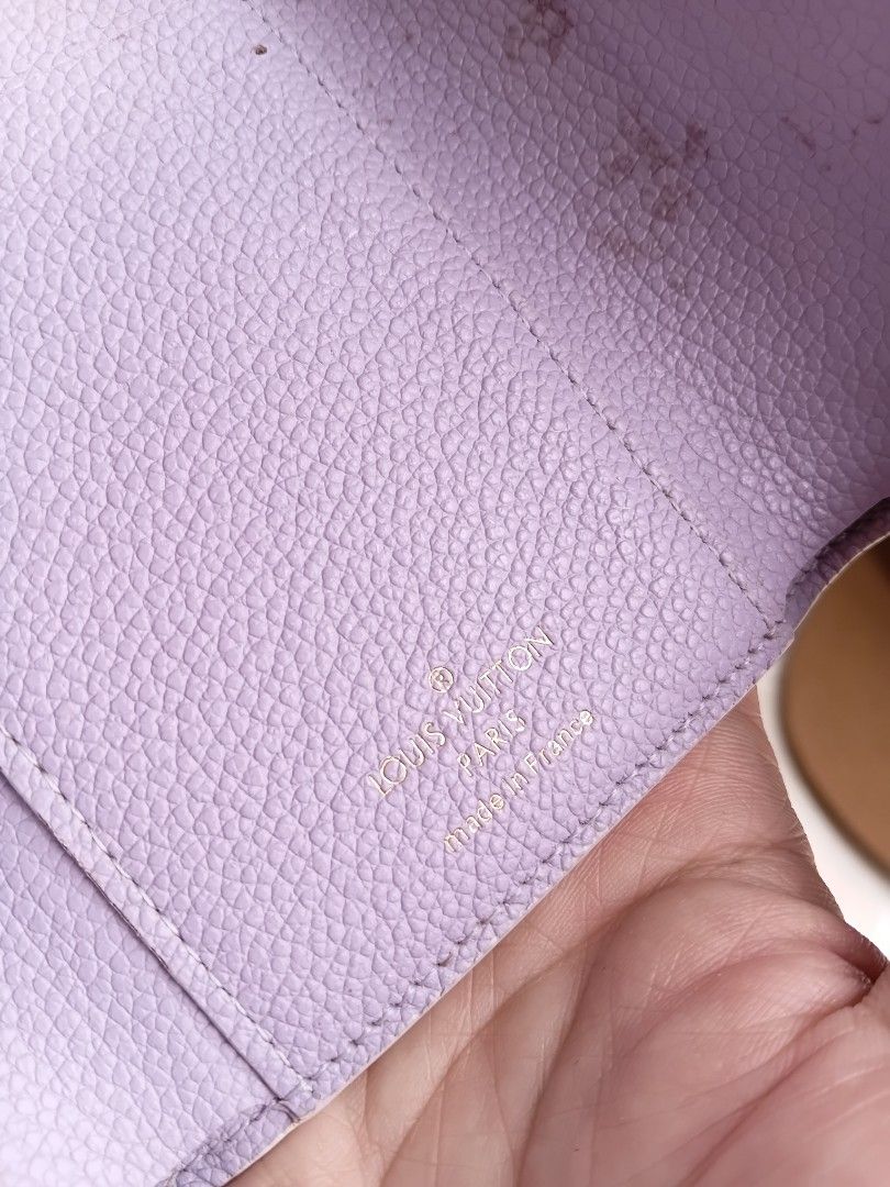 Louis Vuitton Monogram Mini Wallet (Category: Luxury Bags & Wallets) located in Manila. Submitted by grandflower-547aee (Listing ID 1463783612, Image 3). Description: - Authentic Louis Vuitton Mini Wallet - Classic Monogram Pattern (Pastel Shade) - Interior: Lilac Color - Closure: Snap and Zip Compartment - Made in France - Condition: Minor marks inside (please check photos).
