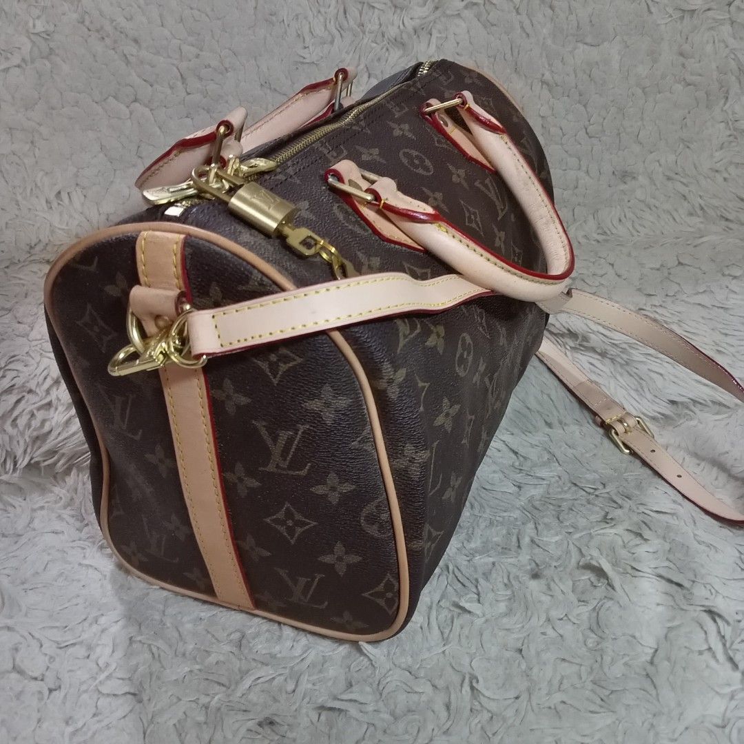 Louis Vuitton Monogram Speedy 30 Bag (Category: Luxury Bags & Wallets) located in Baguio. Submitted by sheren_signatures (Listing ID 1463772654, Image 2). Description: - Classic Louis Vuitton Speedy 30 in Monogram canvas - Comes with detachable shoulder strap - Includes original lock and keys - Interior is clean and well-maintained - Leather trim shows some signs of wear, adding character - Zipper operates smoothly - A versatile and timeless hand