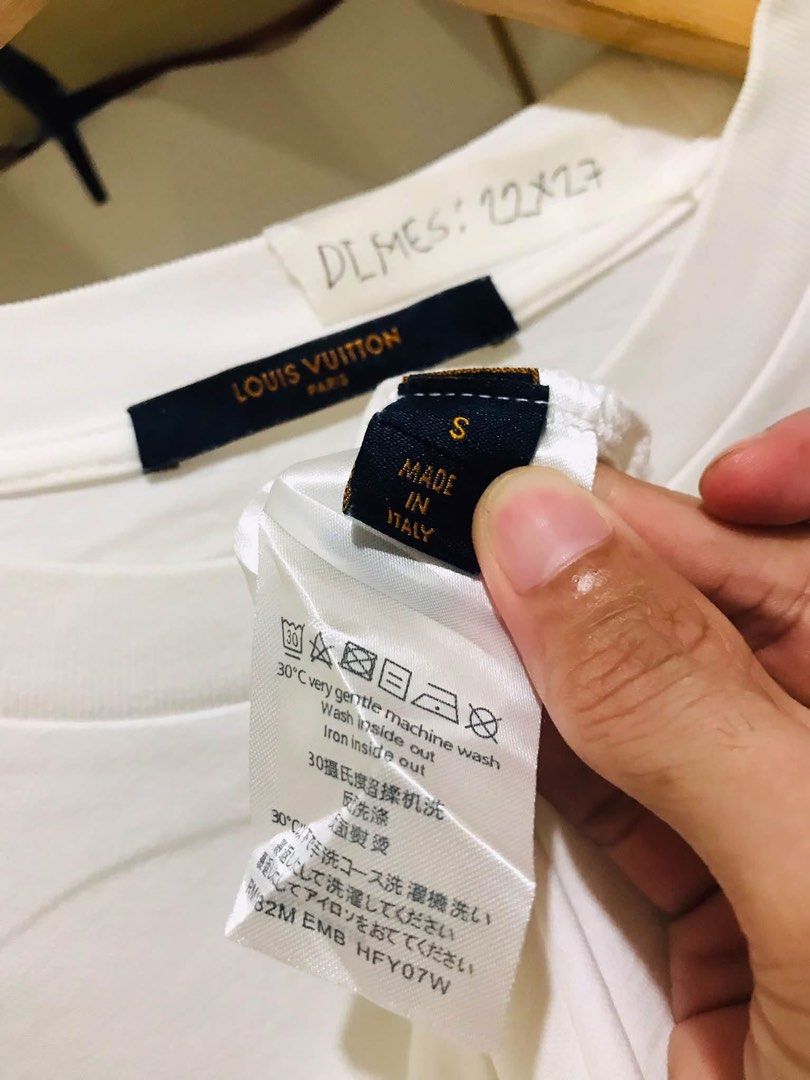 Louis Vuitton Rainbow Monogram T-Shirt (Category: Luxury Apparel) located in Manila. Submitted by luxurybrandedthrift05 (Listing ID 1463856938, Image 2). Description: - Authentic Louis Vuitton white t-shirt - Size: S - Features a striking rainbow monogram print - Made in Italy - Care: Gentle machine wash inside out, iron inside out - Perfect addition to any designer collection.