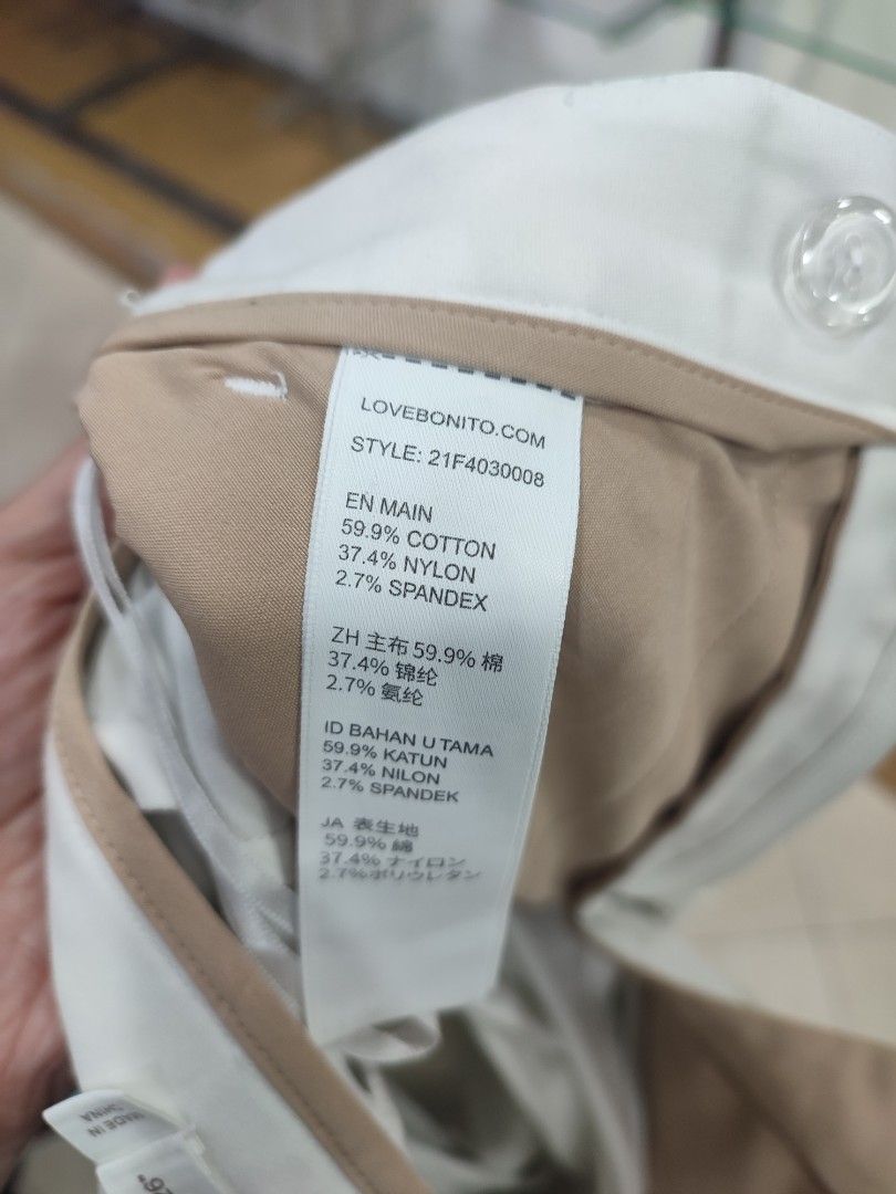Love Bonito White High Waisted Pants (Category: Jeans) located in Jaen. Submitted by roxantiago (Listing ID 1463775065, Image 2). Description: - Brand: Love Bonito - Color: White - Style: High-waisted pants - Material: Cotton, Nylon, Spandex blend - Fit: Comfortable - Occasion: Perfect for casual outings or work attire - Styling: Effortlessly pairs with any top - Condition: Please check photos for details.