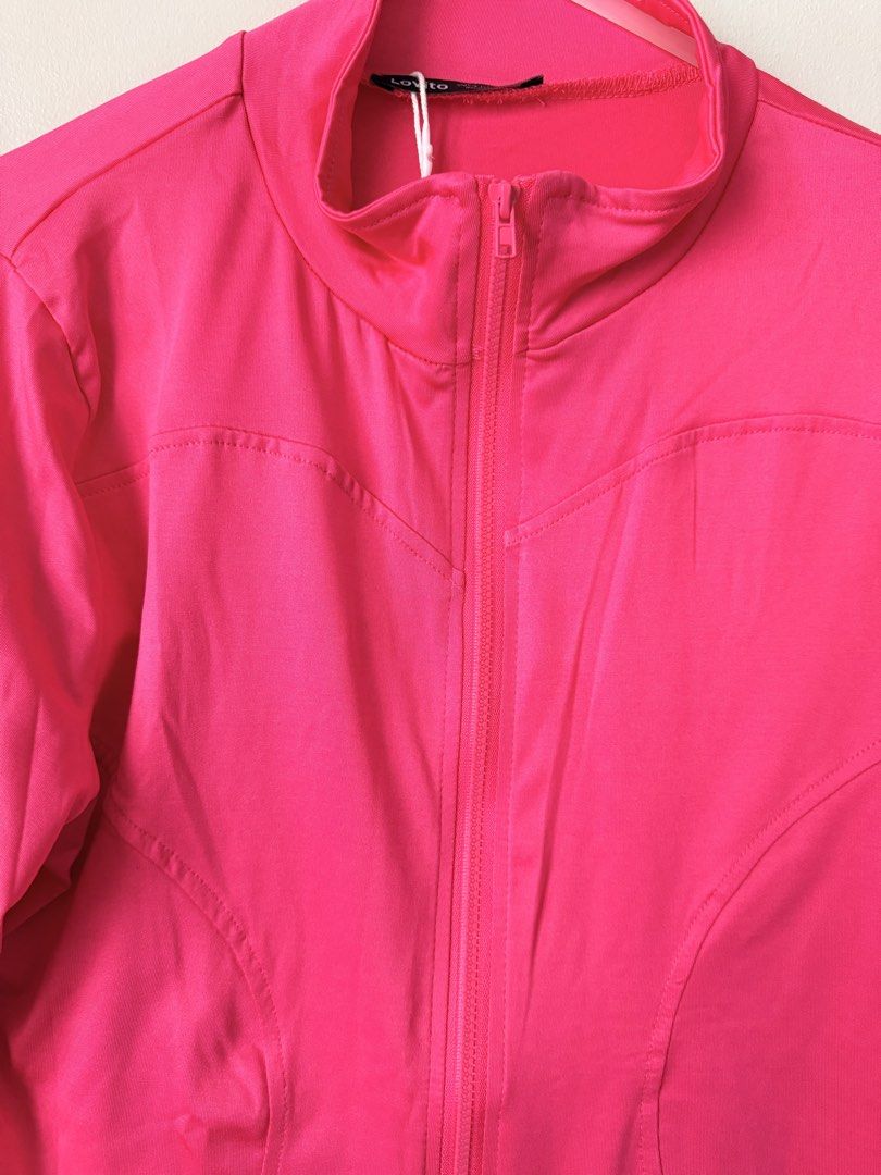 Lovito Pink Zip-Up Jacket (Category: Coats, Jackets and Outerwear) located in Quezon City. Submitted by ninny.ph (Listing ID 1463861438, Image 2). Description: - Brand: Lovito - Color: Pink - Style: Zip-up jacket - Features: Long sleeves, high neckline, cropped fit - Versatile: Ideal for workouts or casual wear - Origin: Made in China.