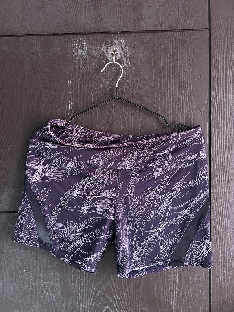 Lululemon Athletica Shorts (Category: Shorts) located in Imus. Submitted by hphzrd333 (Listing ID 1463867507, Image 1). Description: - Lululemon shorts - Size: 10 - Dark purple with white abstract line pattern - Mesh panels on sides - Ideal for workouts, running.